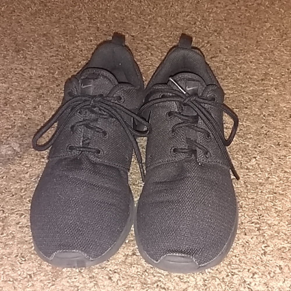 Black Nike running shoes
